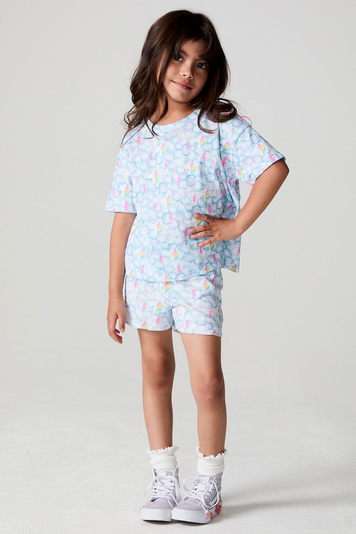 Full body front  view of a girl wearing the Chaser Unicorn Lightning Tee on a neutral backgroundront