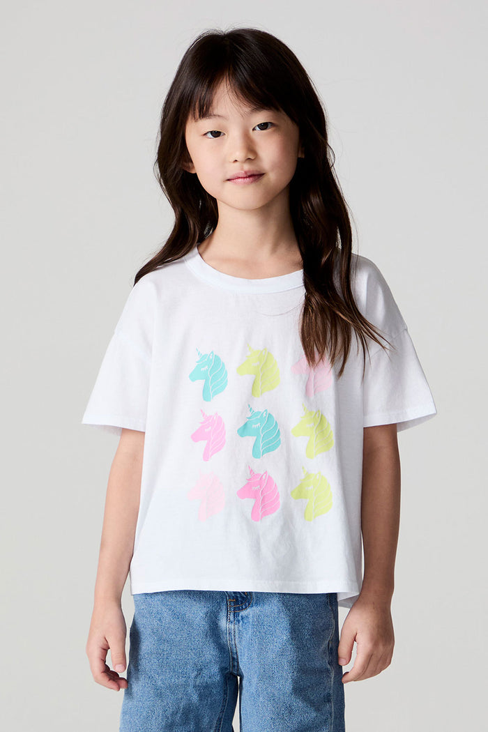 Front view of a girl wearing the Chaser Unicorn Parade Tee on a neutral background