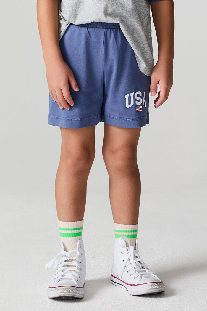 Front view of a boy wearing the Chaser U.S.A. Flag Shorts on a neutral background