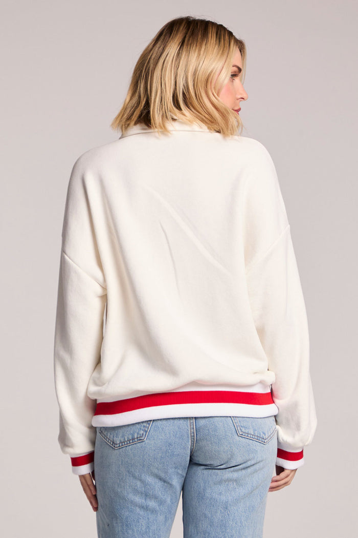Back view of a woman wearing the Chaser USA Pullover on a neutral background