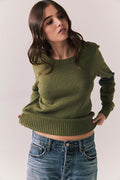 Front view of Varsity Star Sweater in bronze green with slouchy fit and twin arm stripes against a plain background