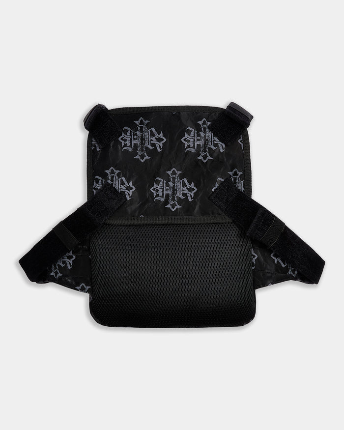 Black backpack with star patterns on a white background