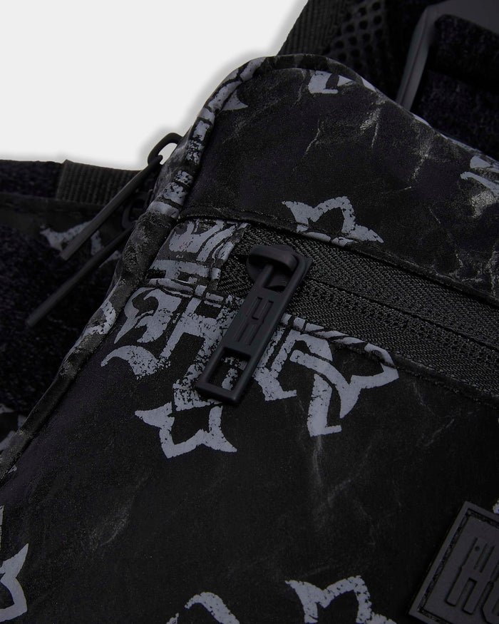 Black bag with white patterns and a visible brand logo on a white background
