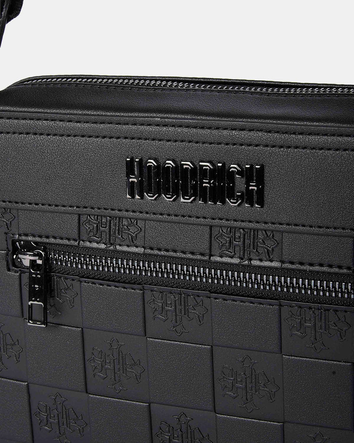 Black bag with 'HOODRICH' branding and embossed pattern on a white background