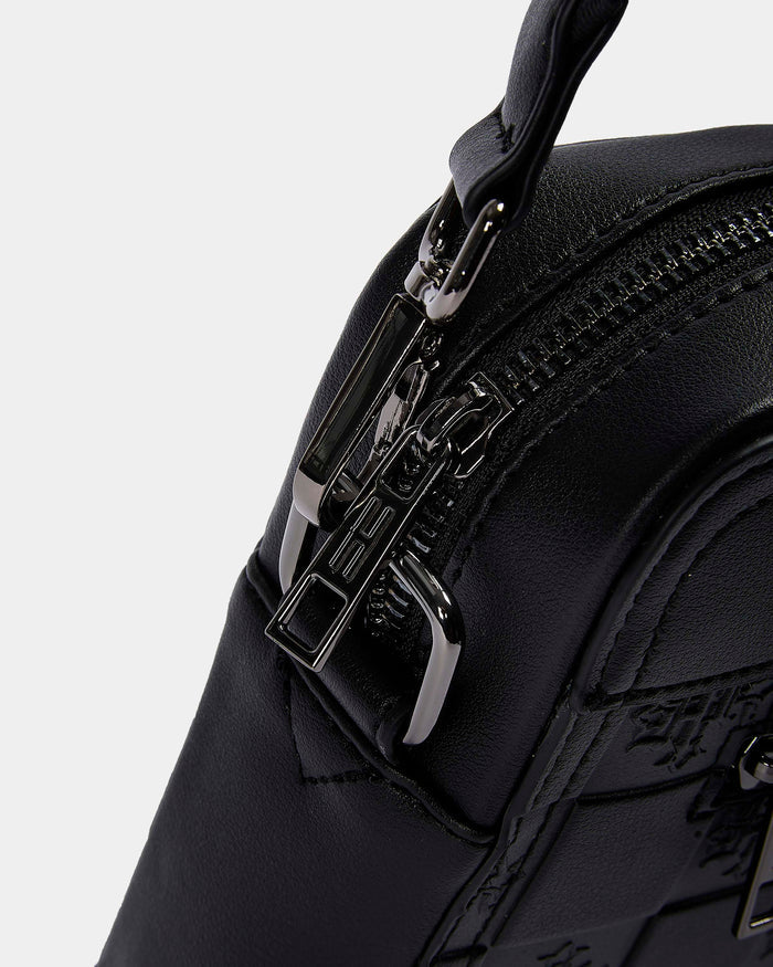 Black backpack with a prominent zipper and brand logo on a light gray background
