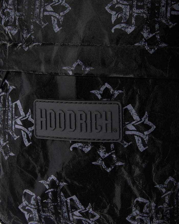Black bag with white floral patterns and Adderich logo