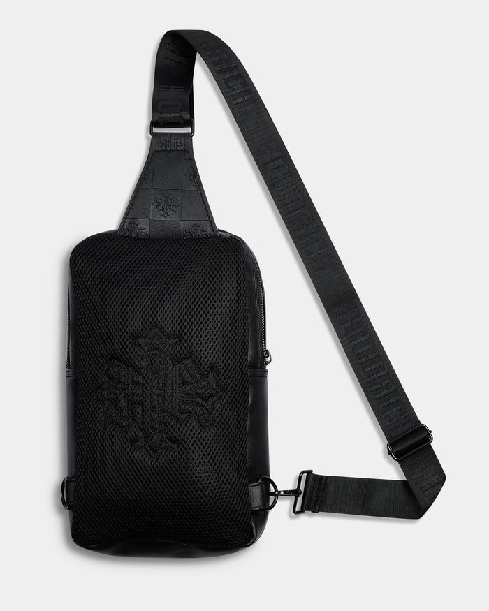 Black textured sling bag with a brand logo on a light gray background