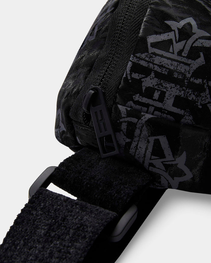Black bag with branding on a light gray background