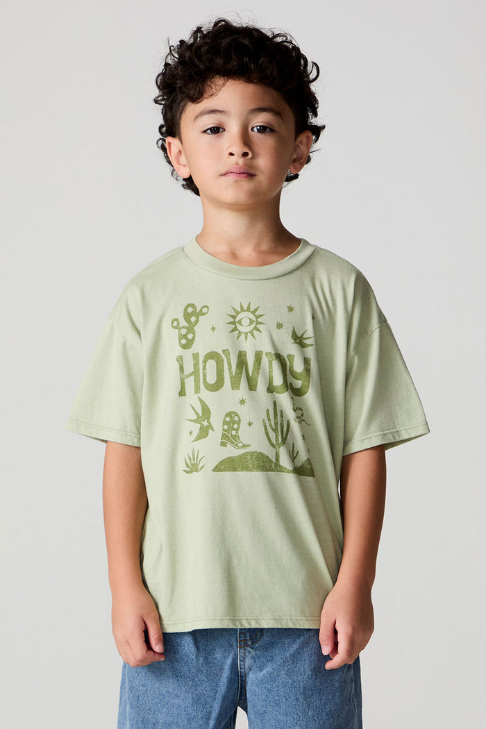 Front view of a boy wearing the Chaser Western Time Tee on a neutral background