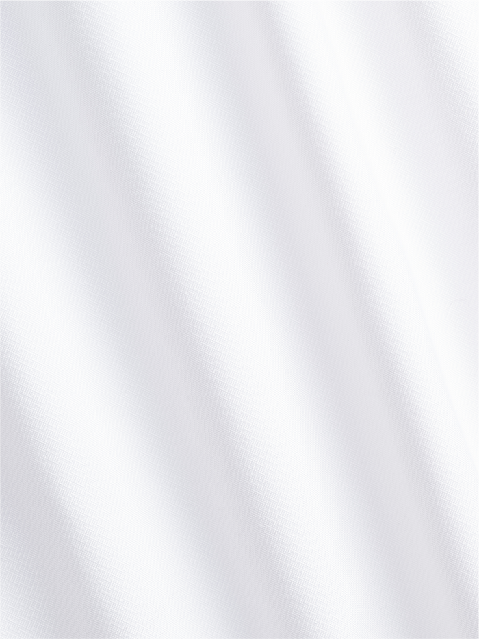Close-up of white stretch cotton fabric with soft diagonal folds