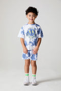 A full body front view of a boy wearing the Chaser Wide Leg Mistel Tie Dye Shorts on a neutral background