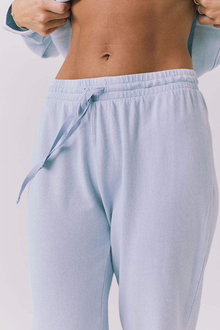 Chaser Willa Blue Bird Joggers close front detail showing elastic waistband and tonal drawstring in Blue Bird