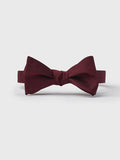 Wine silk butterfly bow tie, tied, on light grey background