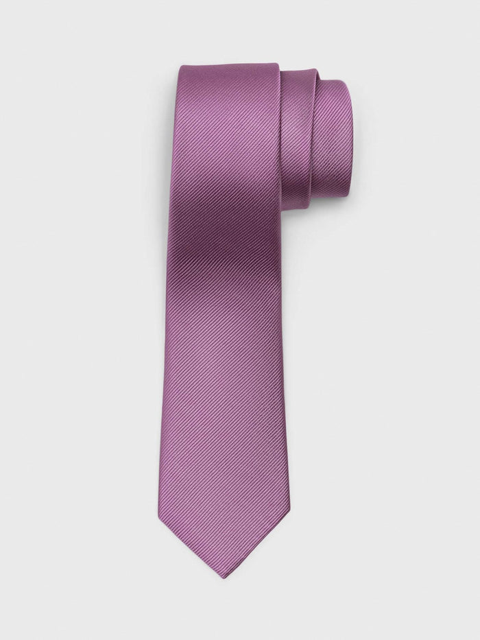 Wisteria purple silk tie, rolled, on light grey background
