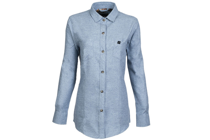 The Women's Cascade Flannel Shirt in Dusty Blue is made from heavy brushed Portuguese cotton, featuring long sleeves, a collared button-up front with dark buttons, and a single chest pocket, shown on a plain white background.
