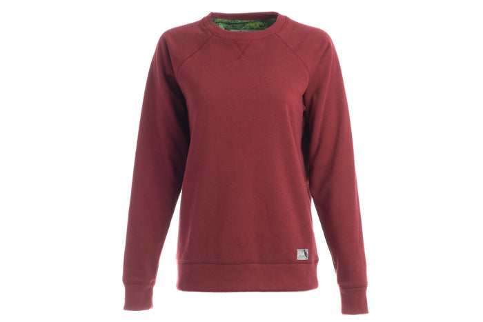 The Pladra Women's Crew Neck Sweatshirt in Pomegranate Red offers cozy fleece, long sleeves, and a classic fit.