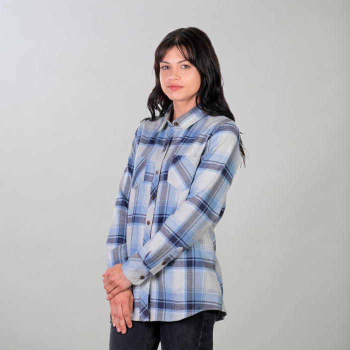 Woman with long dark hair wears the Pladra Women's Every Day Double Weave Shirt in Birch White, hands clasped.