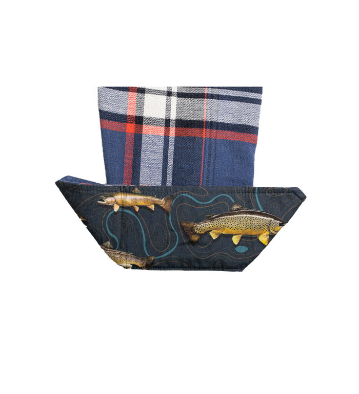 A fabric item with a blue, red, and white plaid top, like the Women's Every Day Double Weave Shirt- Sunset Blue, and a lower section featuring fish illustrations swimming on dark wavy blue lines.