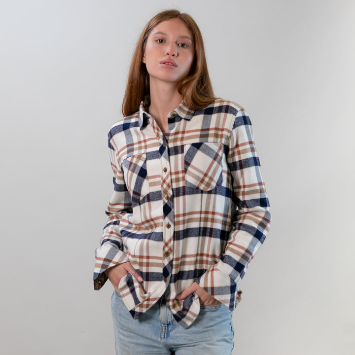 Women's Every Day Elite Flannel Shirt in Whitefish Tan, a white, brown, and blue premium cotton plaid, worn with light blue jeans.
