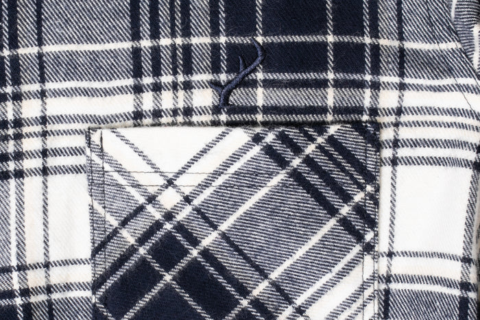 Close-up of Pladra Women's Every Day Flannel Shirt in Butte Blue with matching pocket and buttonhole detail.