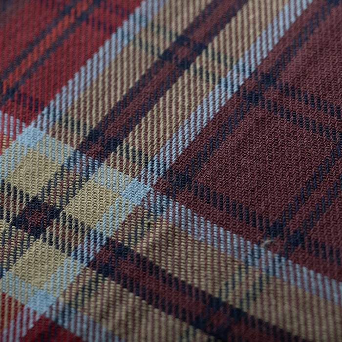 Close-up of Pladra's Women's Every Day Flannel Shirt in Harvest Red, highlighting its textured plaid material.