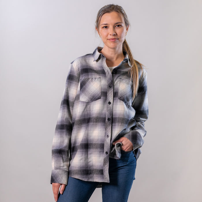 Women's Every Day Flannel Shirt in Sterling Grey Heather, worn with blue jeans.