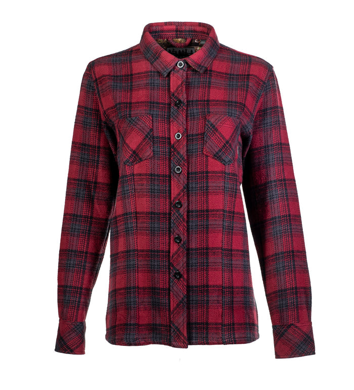 The Women's Fireside Flannel in Deadwood Red is a long-sleeved, button-up shirt made from heavyweight Portuguese flannel, featuring a red and black plaid pattern, two chest pockets, and a fold-over collar.