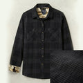 Pladra Women's Fireside Flannel in Night Black: heavyweight plaid shirt with printed cuffs and textured fabric weave.