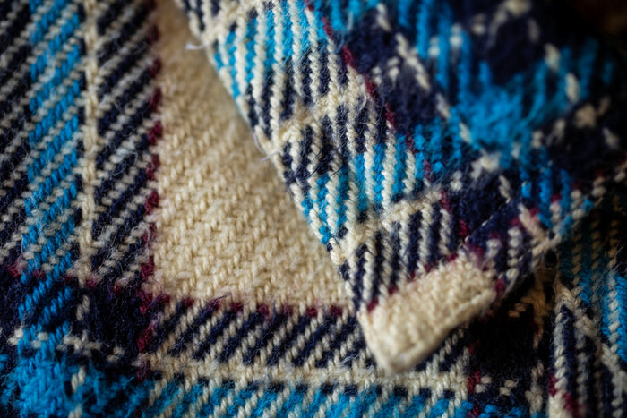 Close-up of Pladra Women's Fireside Flannel in Tahoe Tan, highlighting intersecting lines and textured surface.