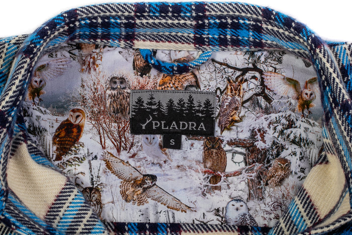 Close-up of the Women's Fireside Flannel-Tahoe Tan by Pladra, featuring a soft owl-themed forest print collar lining.