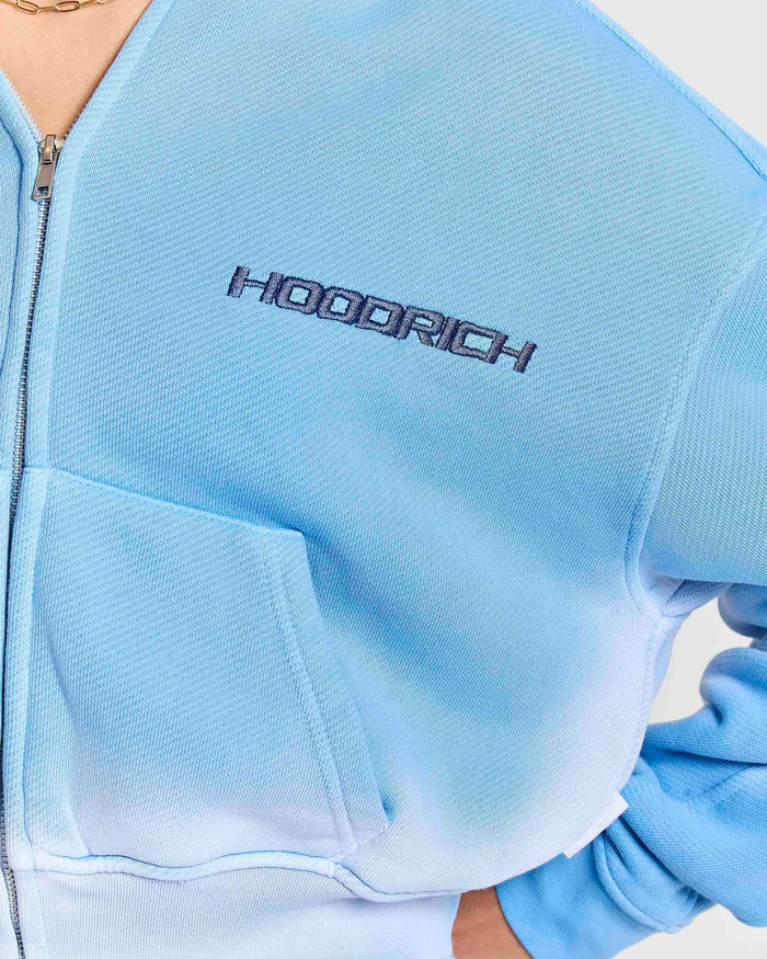 Light blue jacket with 'HOODRICH' branding on a white background
