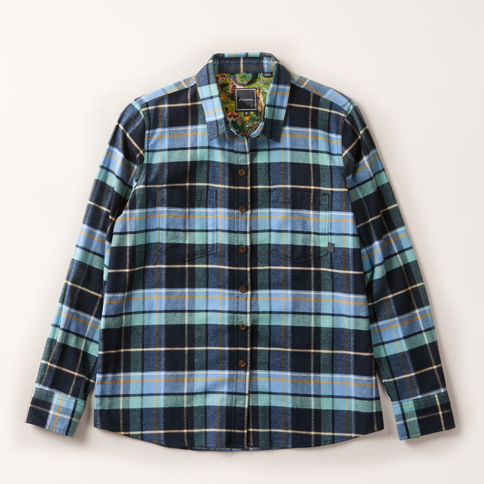 The Women's Relaxed Every Day Flannel Shirt in Bay Blue features soft Portuguese cotton, a relaxed fit, blue plaid tones, a single chest pocket, colorful inner collar lining, and is shown laid flat on a light background.