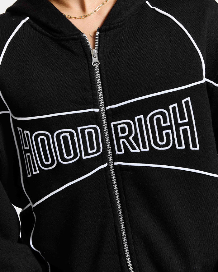 Black hoodie with 'HOOD RICH' text on a person wearing it.