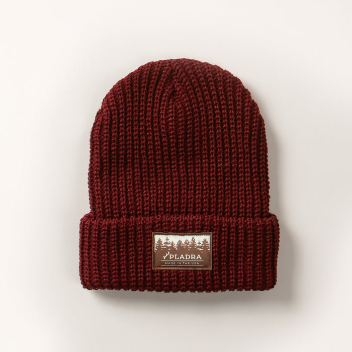 Woodsman Heavyweight Cuff Beanie in Burgundy Red, a knit beanie with a folded brim and a tree patch reading PLADRA. Made in the USA.
